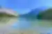 People canoeing across crystal clear waters in Emerald Lake, Yoho National Park