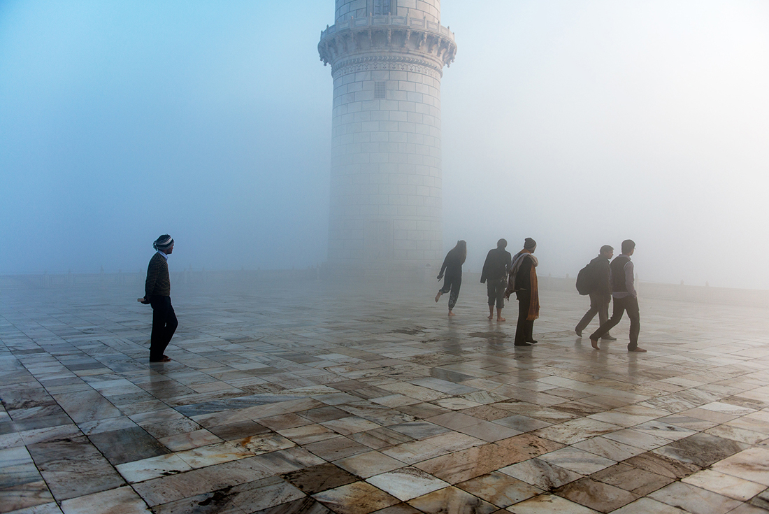 india agra taj mahal fog walking