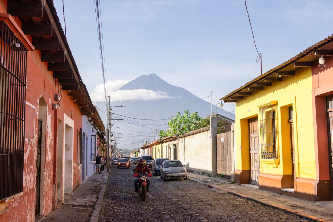 Acatenango volcano looms over the streets of Antigua in Guatemala