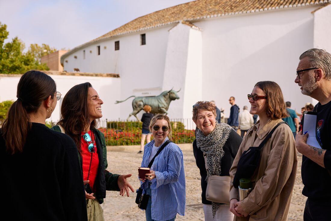A group talk and a laugh in Ronda, Andalusia