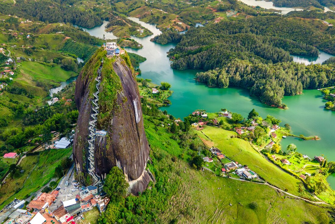 Aerial view of Guatape Rock and nearby towns, rivers and rainforests, Colombia