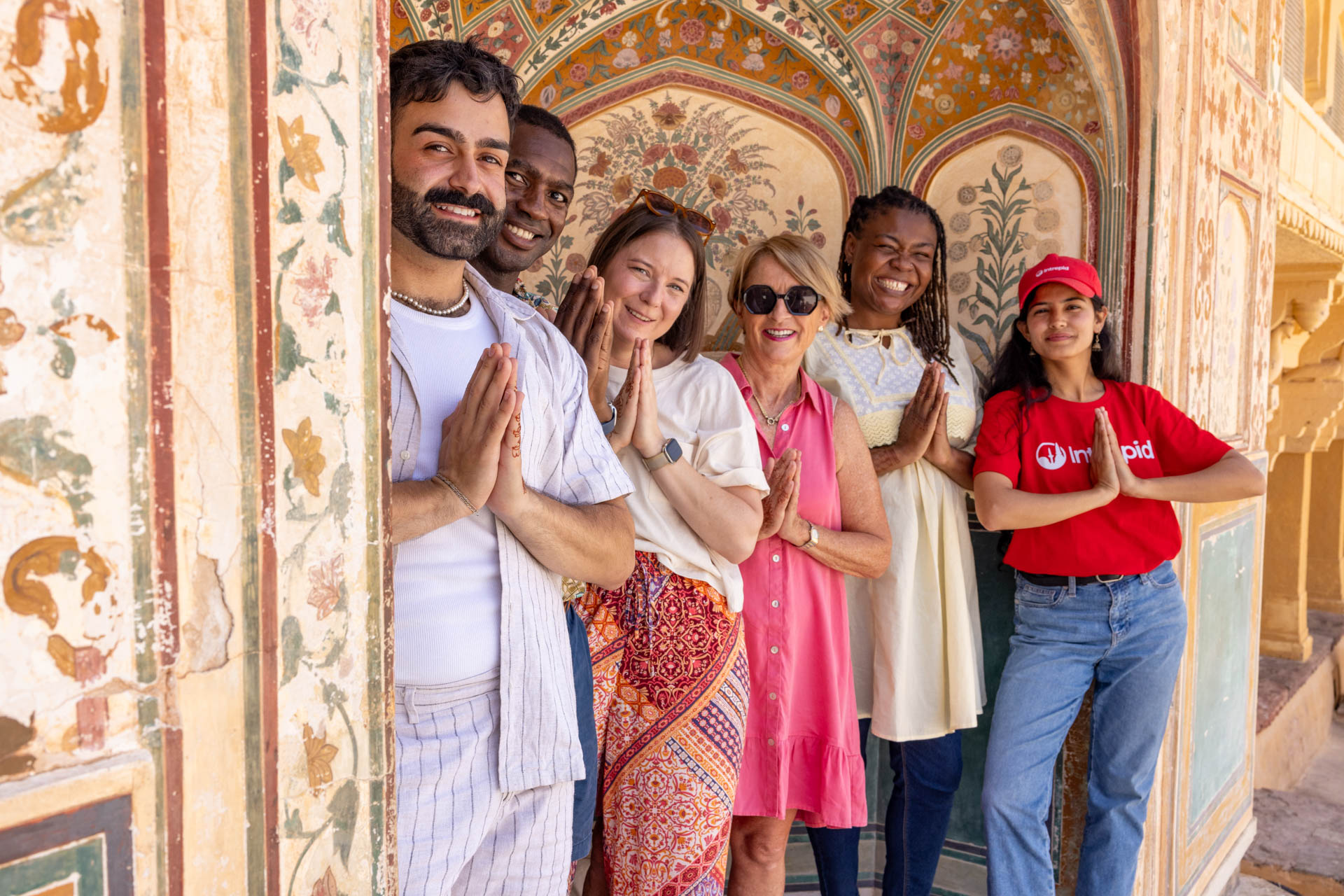 Share a moment in the intricately painted and carved halls of Jaipur's Amber Fort