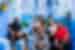 Travellers and leader pose for group shot in Chefchaouen's blue streets