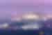 Aerial view of Faisal Mosque in Islamabad with purple sky