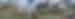 Panorama of Nangma Valley campsite with river flowing by backed by huge craggy mountains with snow