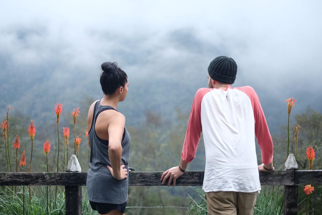Travellers at a lookout over Cocora Cloud Forest in Cocora Valley Colombia