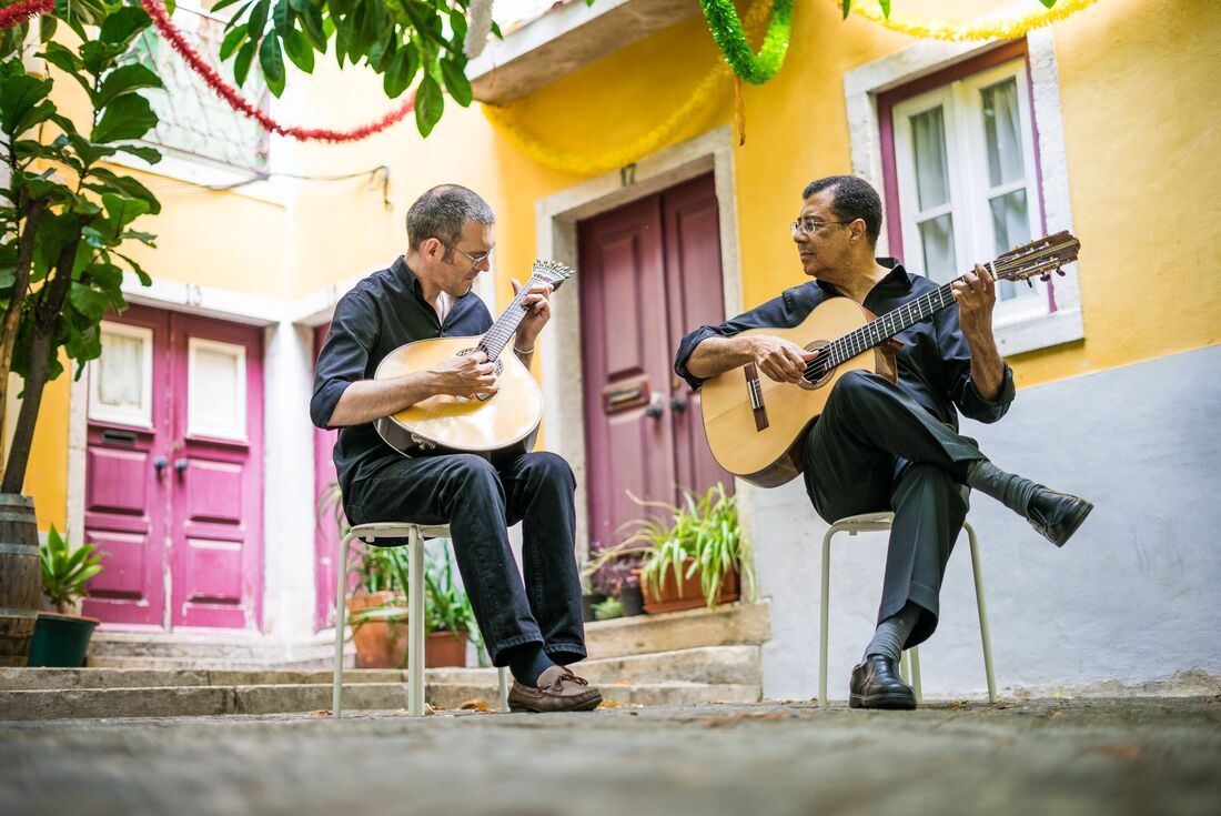 Portuguese street guitar performers in Alfama, Lisbon