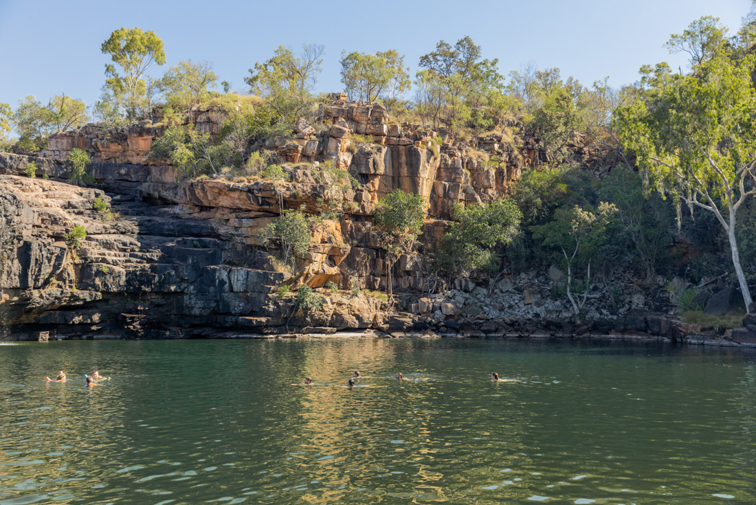Family travellers swimming at Manning Gorge in Western Australia with inrepid