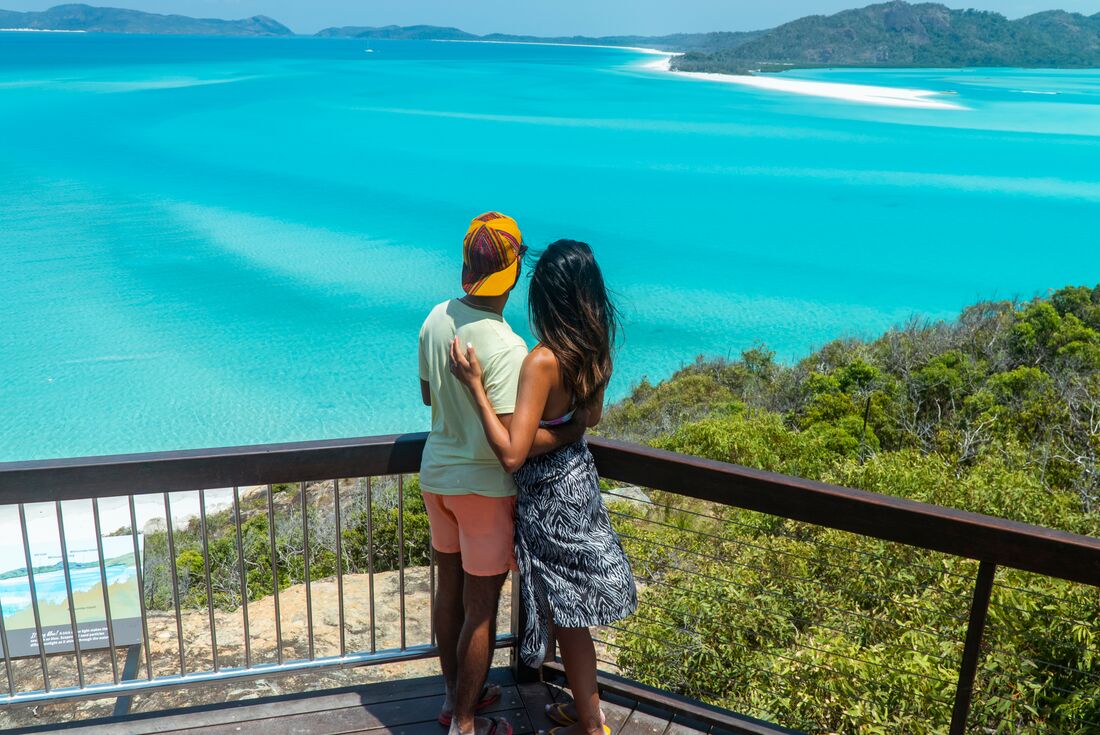 Travellers enjoying the view of the Whitehaven beach in Whitsundays, Australia