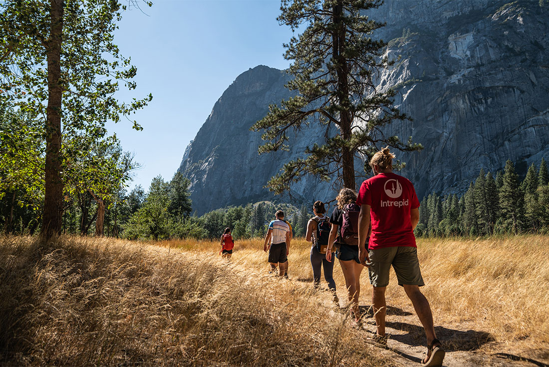 Leader at the back of Intrepid traveller group in Yosemite National Park near Half Dome