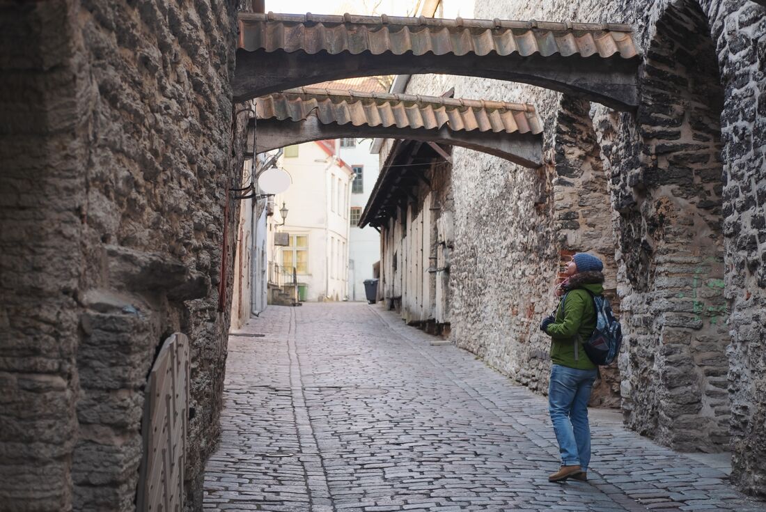 Travelling admiring architecture of old town Tallinn, Estonia