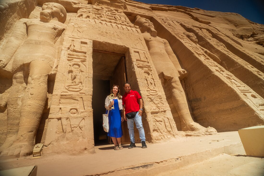 Traveller and Leader take photo together in front of Abu Sibel Temple, Aswan, Egypt