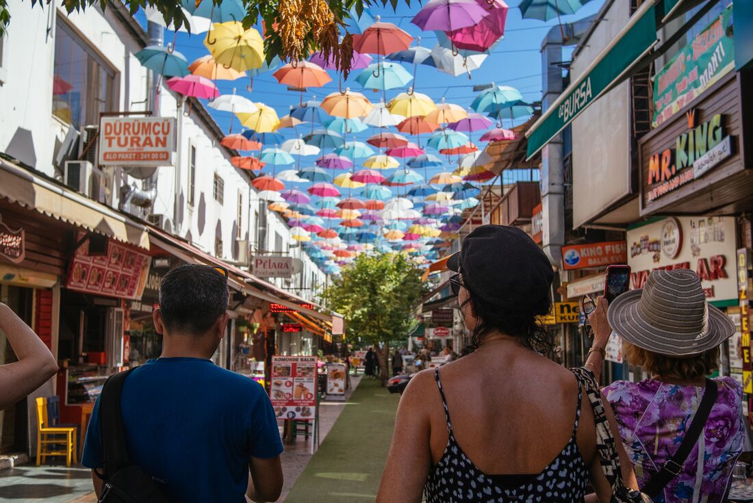 Intrepid travellers walking through the streets of Antalya