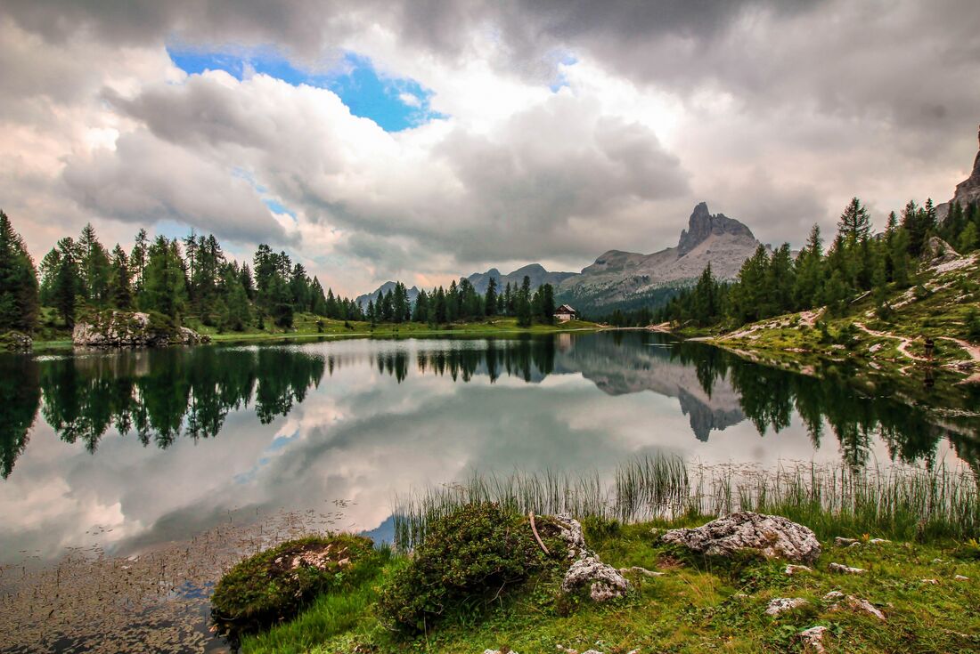 Becco di Mezzodi towers beyond Federa Lake in the Italian Dolomites