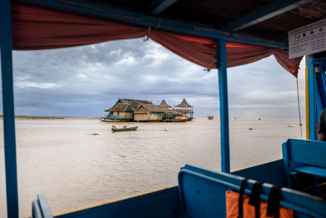 Approaching Tonle Sap Lake's floating village and markets of houseboats