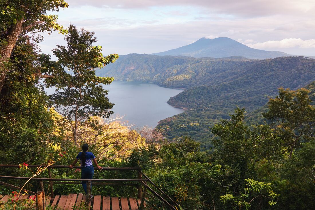 Traveller looks out over the landscape of Mombacho Volcano Natural Reserve