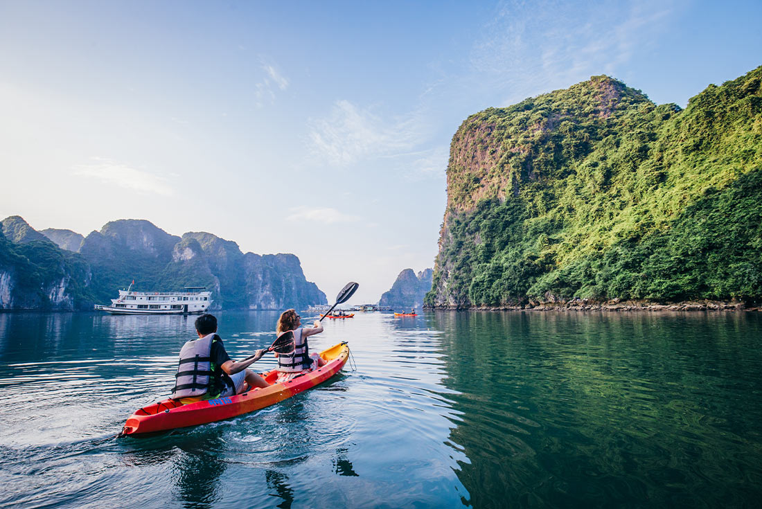 Travellers kayaking in Vietnam