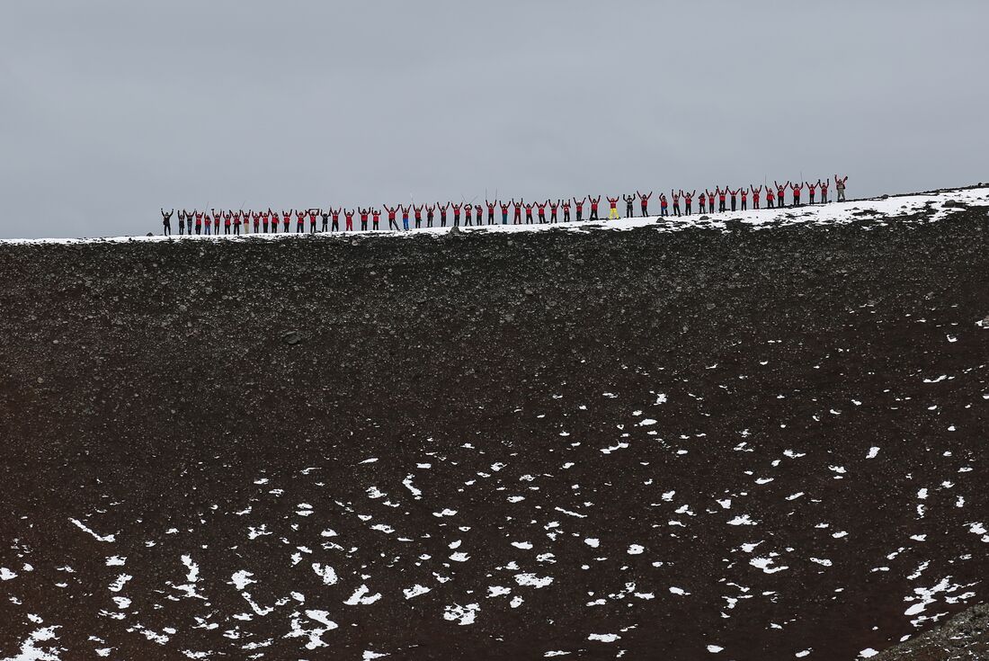 Celebrating atop the rim of Deception Island