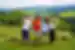 Leader points to elements of hill landscape in Monteverde Costa Rica