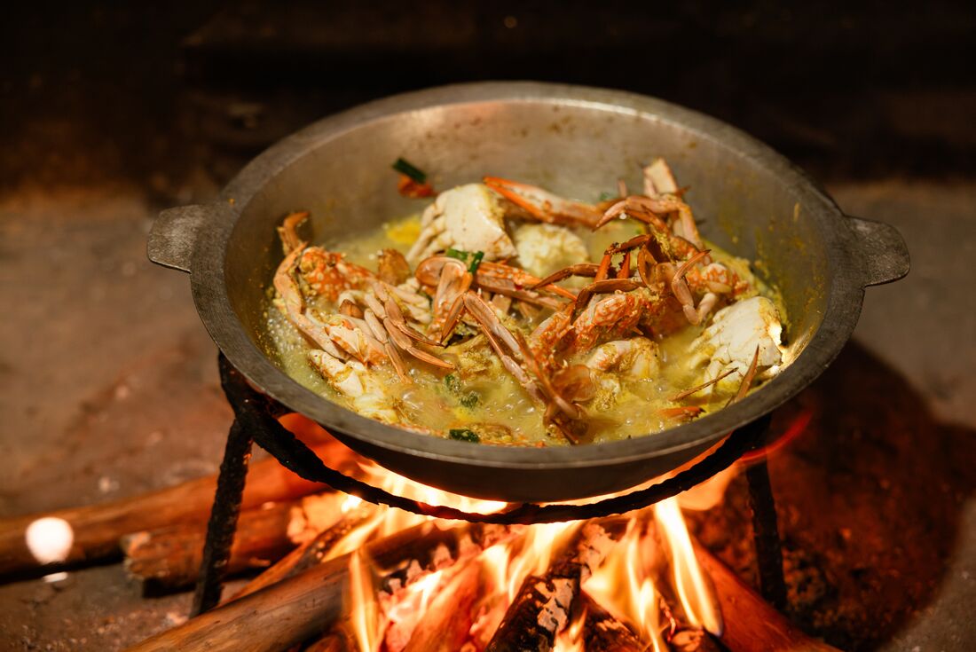 Crab curry being cooked at the cooking demonstration in Mirissa, Sri Lanka